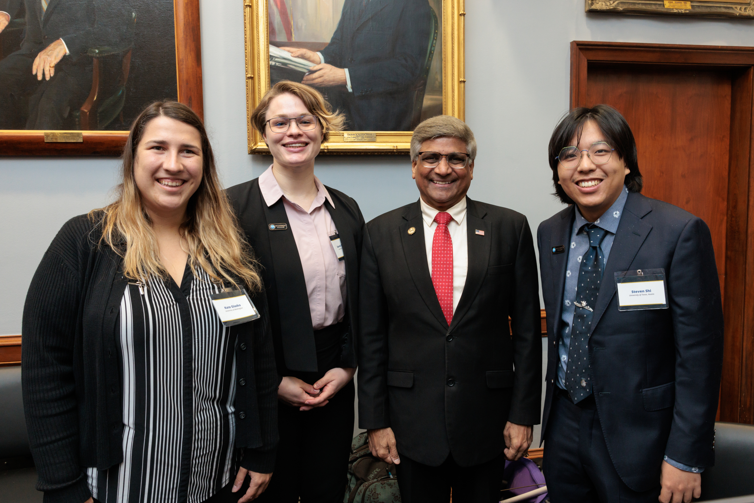 NSF Director Sethuraman Panchanathan (center right) with NSF CSGrad4US Fellows Kate Glazko (left), Sarah Boelter (center left), and Steven Shi (right). Photo credit: Charlotte Geary/NSF.