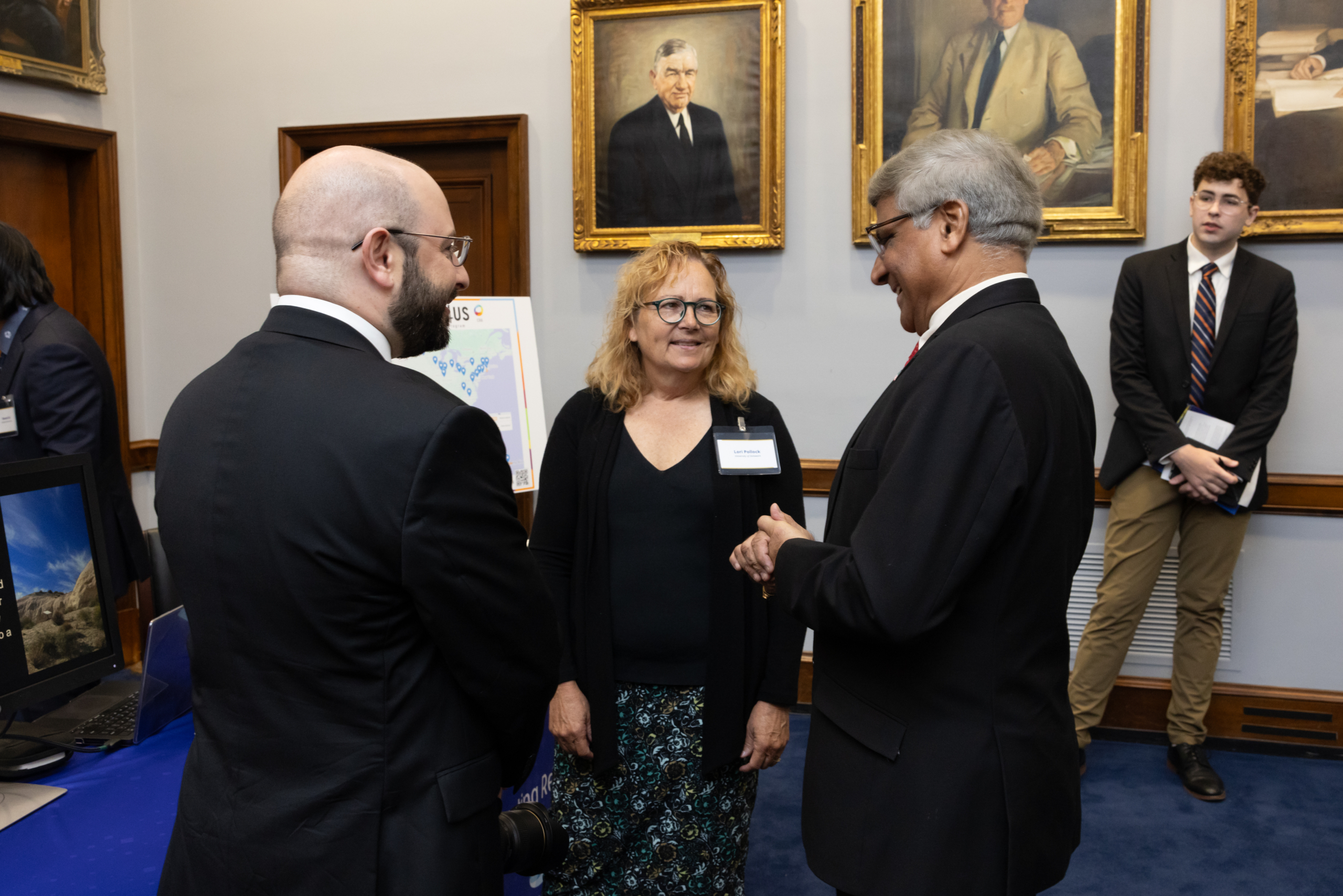 NSF Director Sethuraman Panchanathan (right) with NSF CSGrad4US Program Chair Lori Pollock (center) and CRA Associate Director of Government Affairs Brian Mosley (left). Photo credit: Charlotte Geary/NSF.