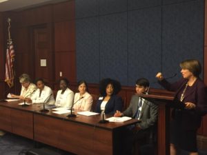 Sen. Klobuchar (D-MN) (at podium) introduces the first briefing of the Diversity in Tech caucus. Rebecca Wright (seated, third from right), represented CRA-W on the panel. 